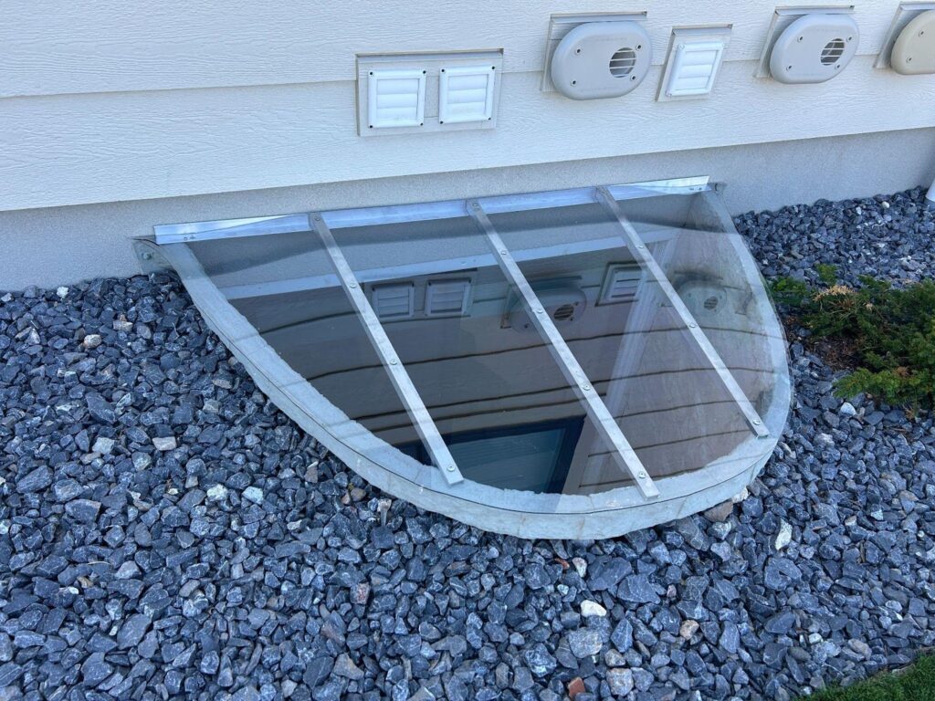 A glass door integrated into a house window highlighting a contemporary style and inviting ambiance